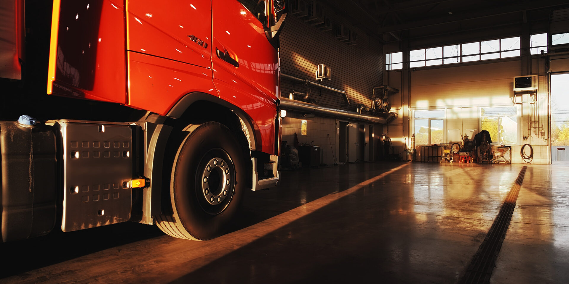 Red Volvo Truck Parked Inside