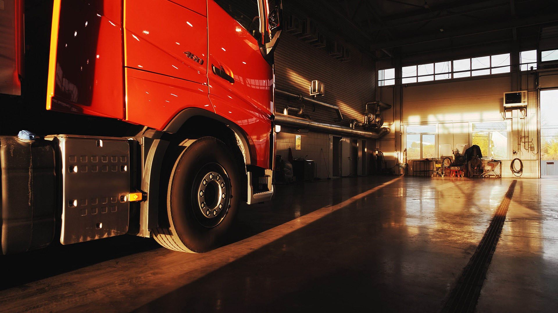 Red Volvo Truck Parked Inside