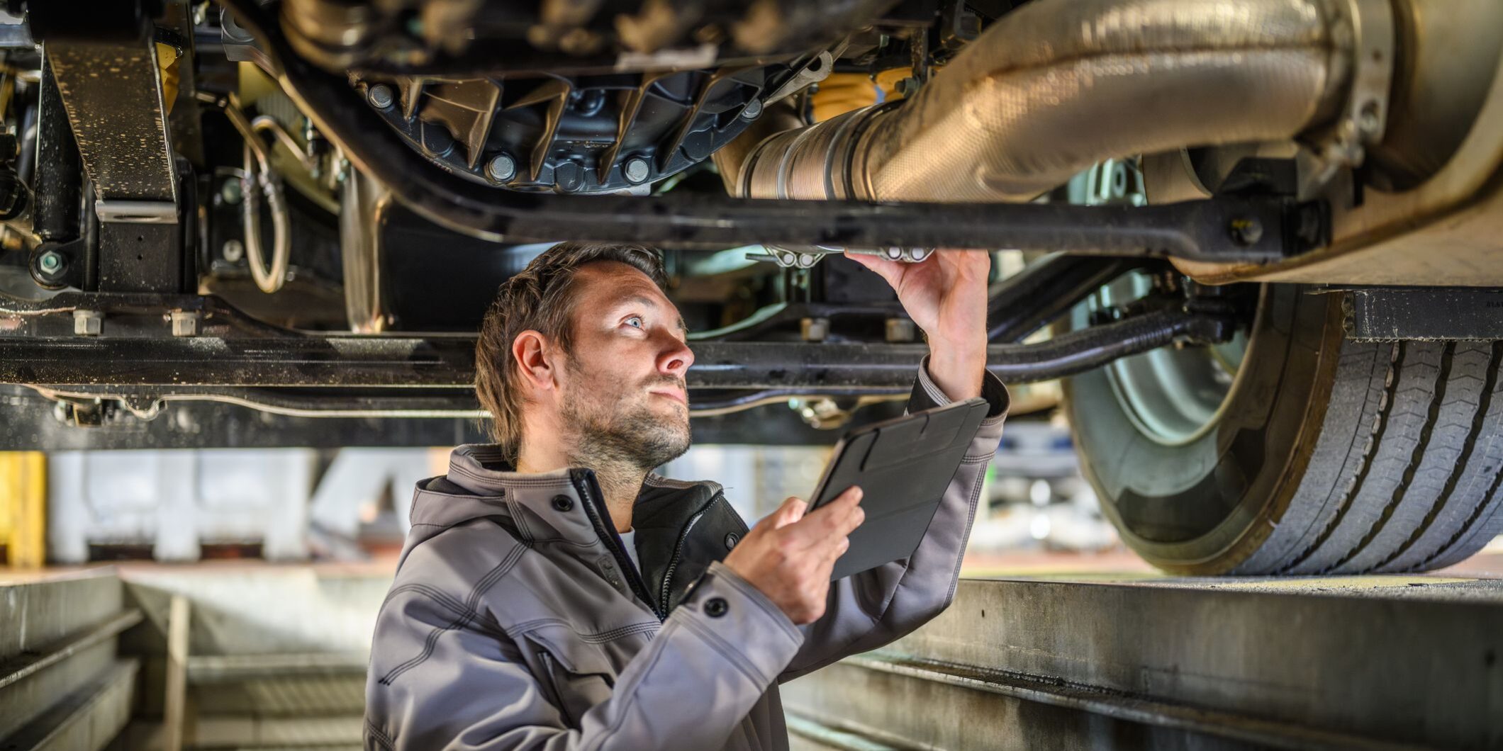 Mechanic Servicing Vehicle